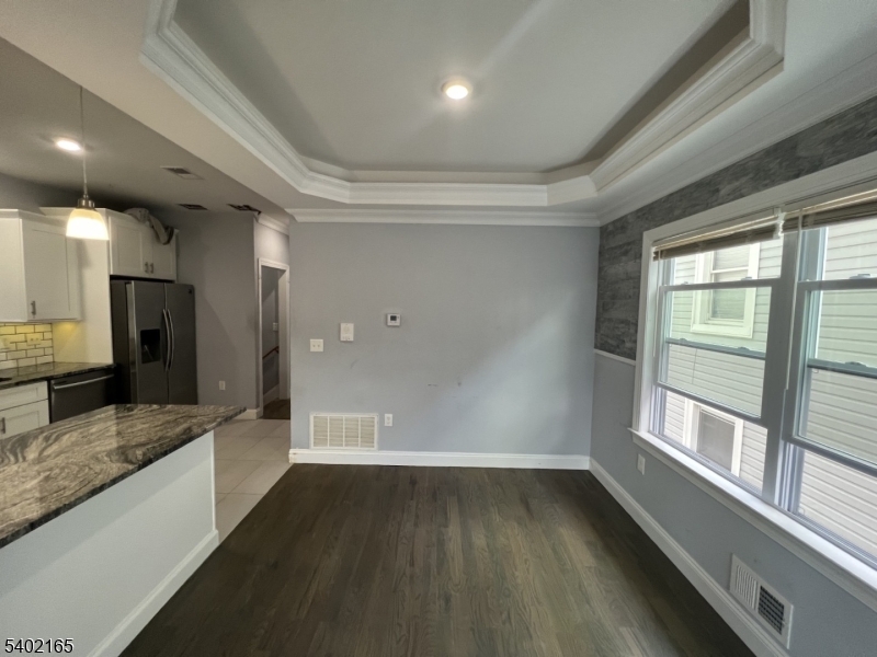 454 3rd Avenue Elizabeth Port, NJ 07206 - Photo 2 of 11 a view of a large kitchen with a large window