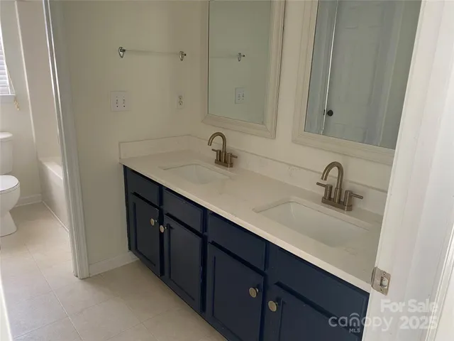 a bathroom with a sink and a toilet