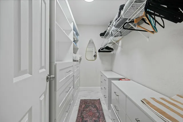 a storage room with a washer and dryer