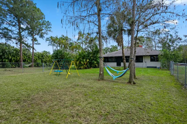a view of a park with a slide