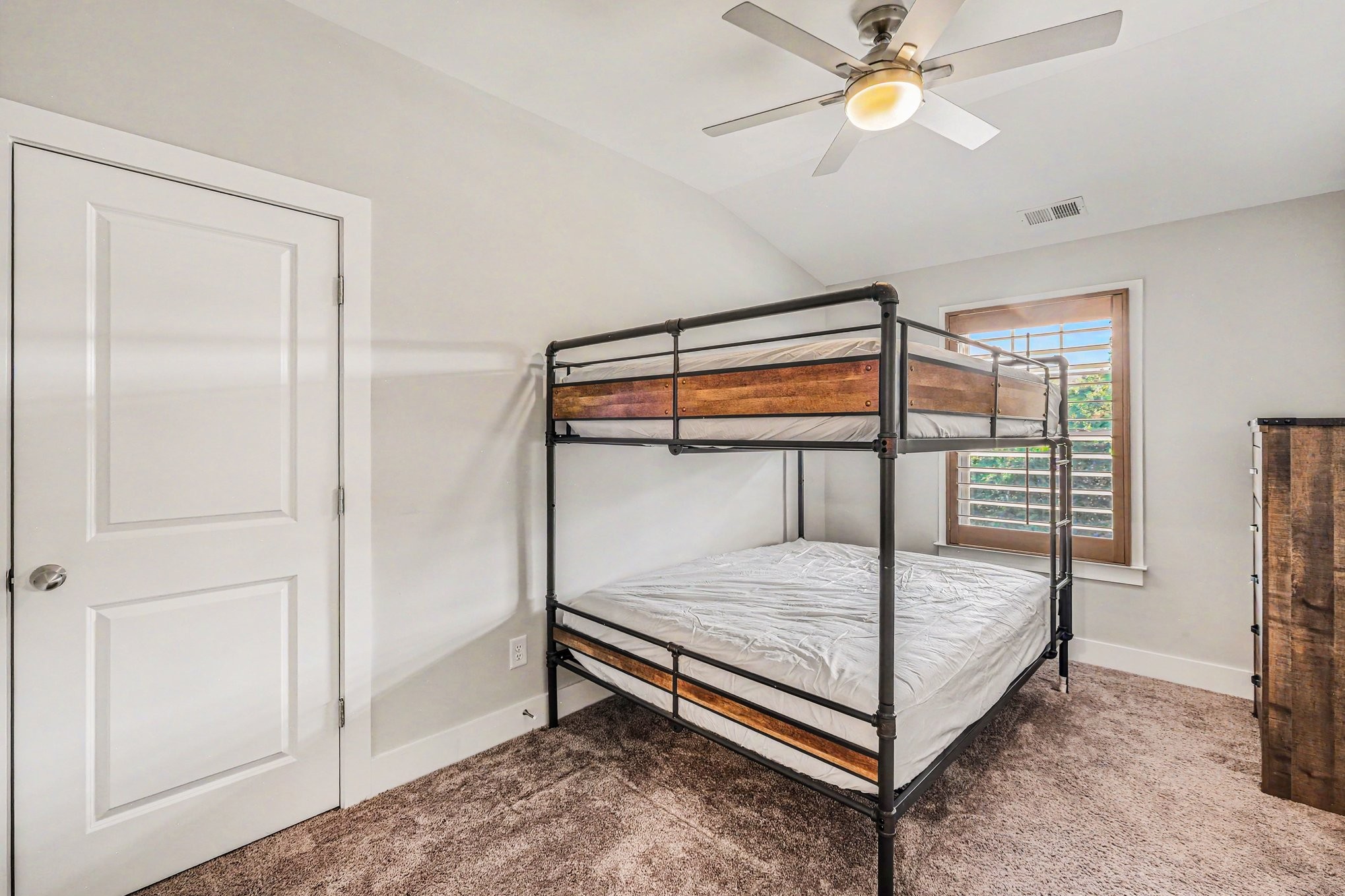 1144 Lock 4 Road, Unit H3 Gallatin, TN 37066 - Photo 22 of 22 a bedroom with a bed and a chandelier