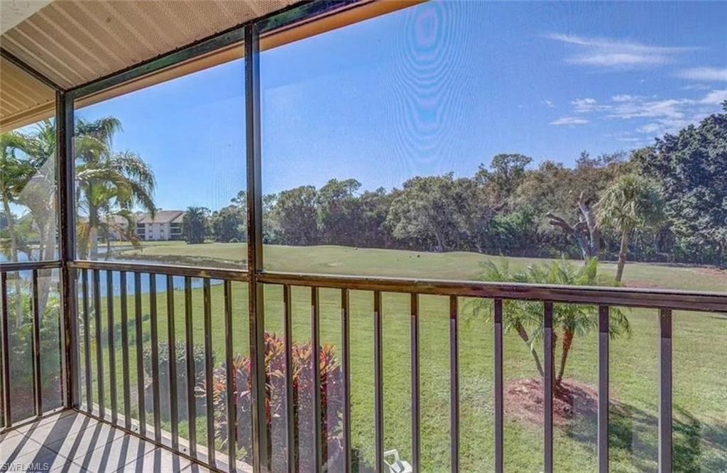 13130 White Marsh Lane, Unit 207 Fort Myers, FL 33912 - Photo 15 of 15 a view of a balcony with outdoor space