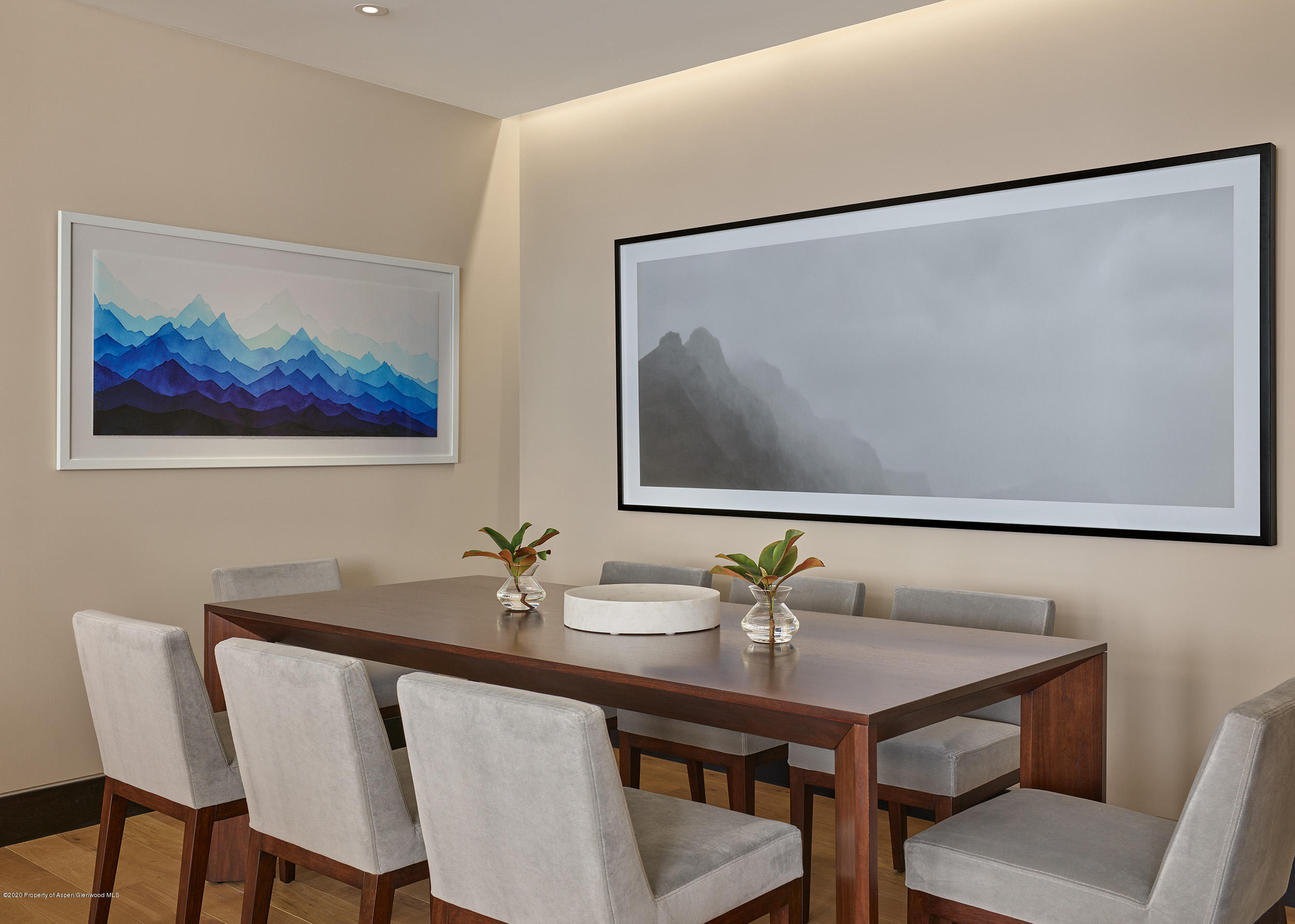 77 Wood Road, Unit 503 EAST Snowmass Village, CO 81615 - Photo 3 of 7 a view of a dining room with furniture and wooden floor