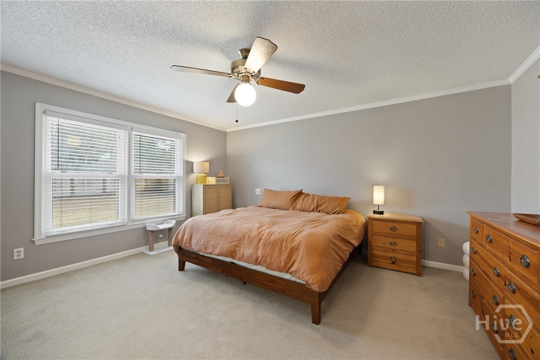 46 North Nicholson Circle Savannah, GA 31419 - Photo 22 of 43 Primary Suite with walk-in closet and private bathroom