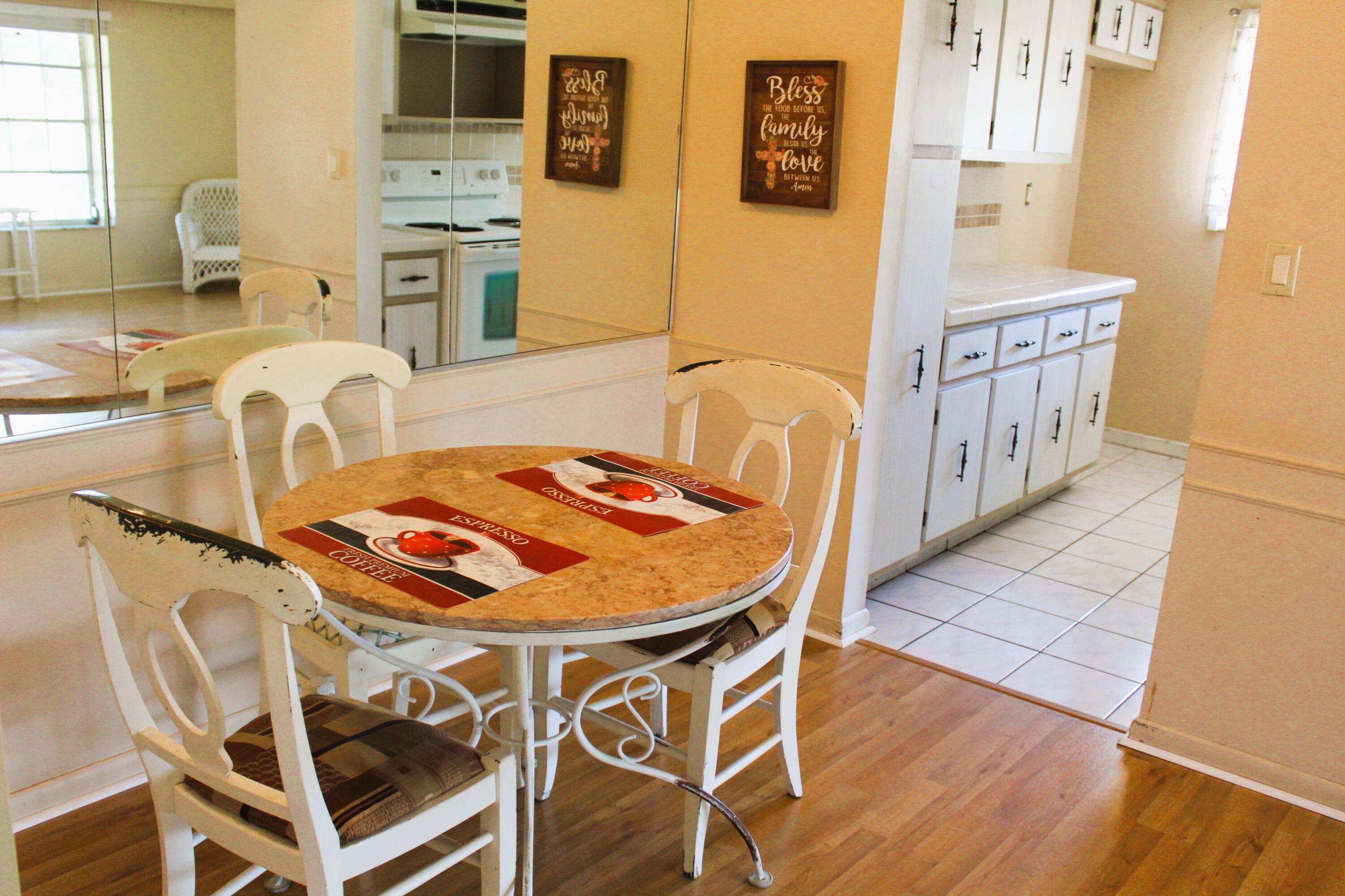 540 High Point Drive, Unit A Delray Beach, FL 33445 - Photo 2 of 13 Dining Room to Kitchen