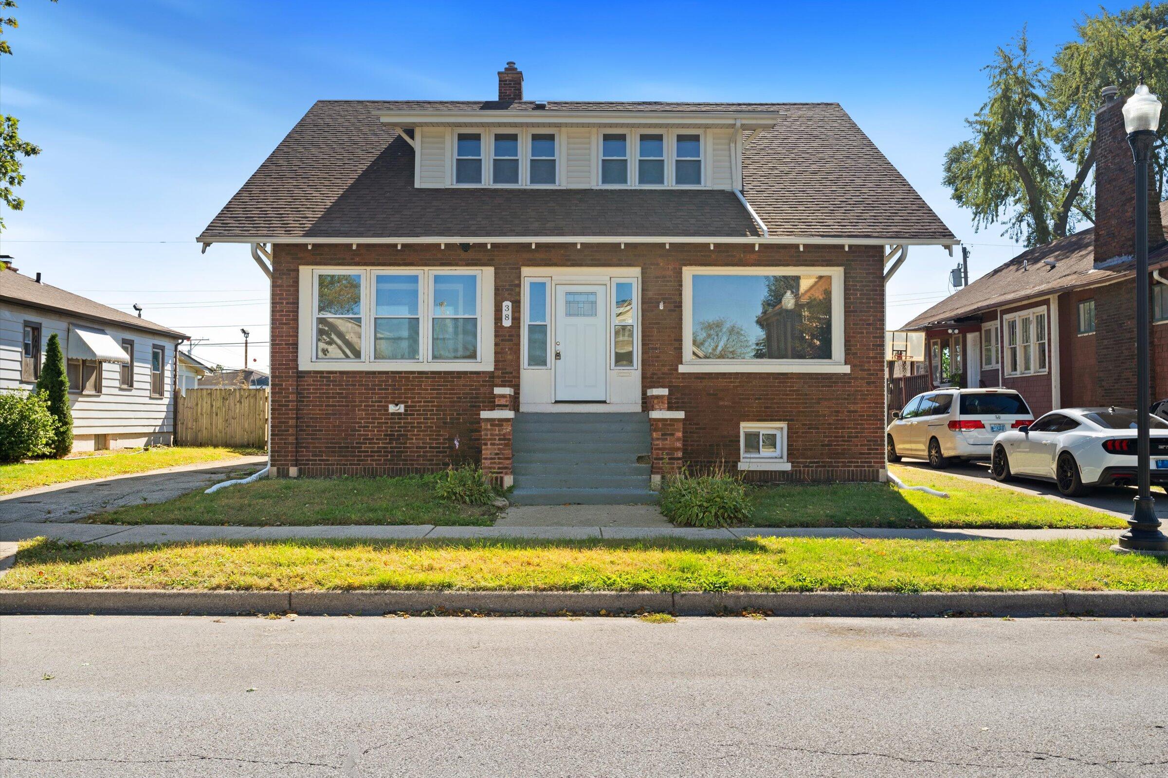 a view of a house with a swimming pool