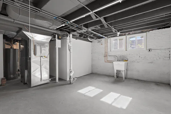 a view of empty room with wooden walls