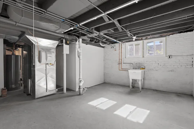 a view of empty room with wooden walls