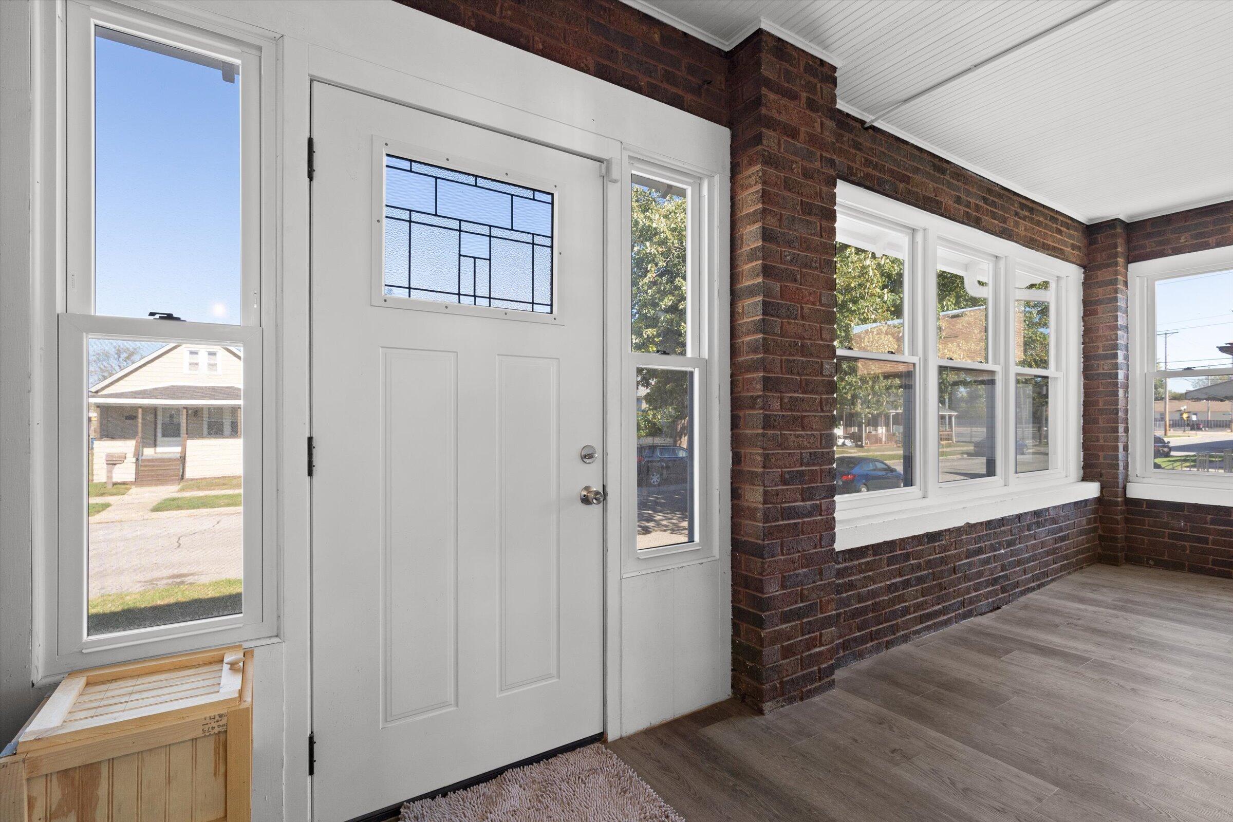 38 Condit Street Hammond, IN 46320 - Photo 4 of 36 a view of front door of house with wooden floor