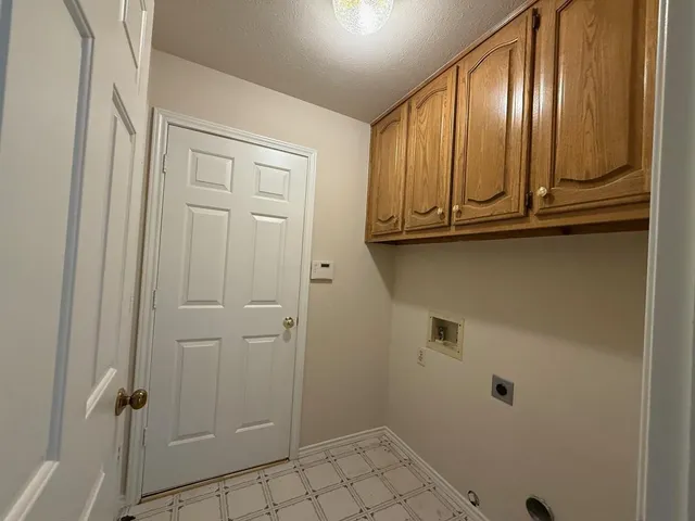 a view of room with washer and dryer