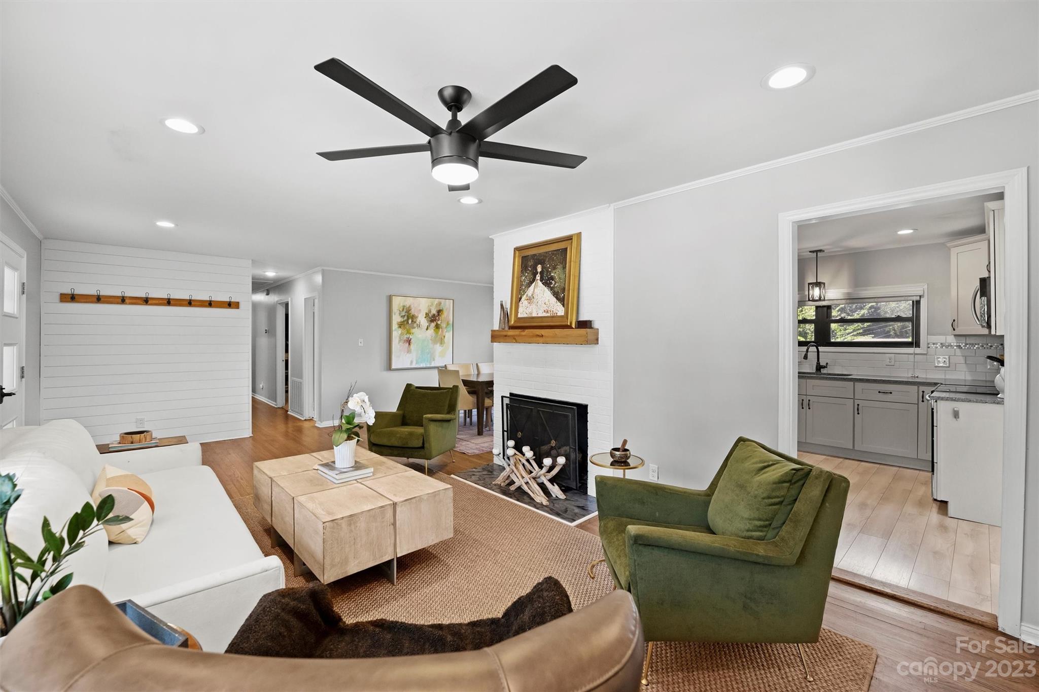 714 Brockbank Road Charlotte, NC 28209 - Photo 11 of 38 a living room with furniture and a fireplace