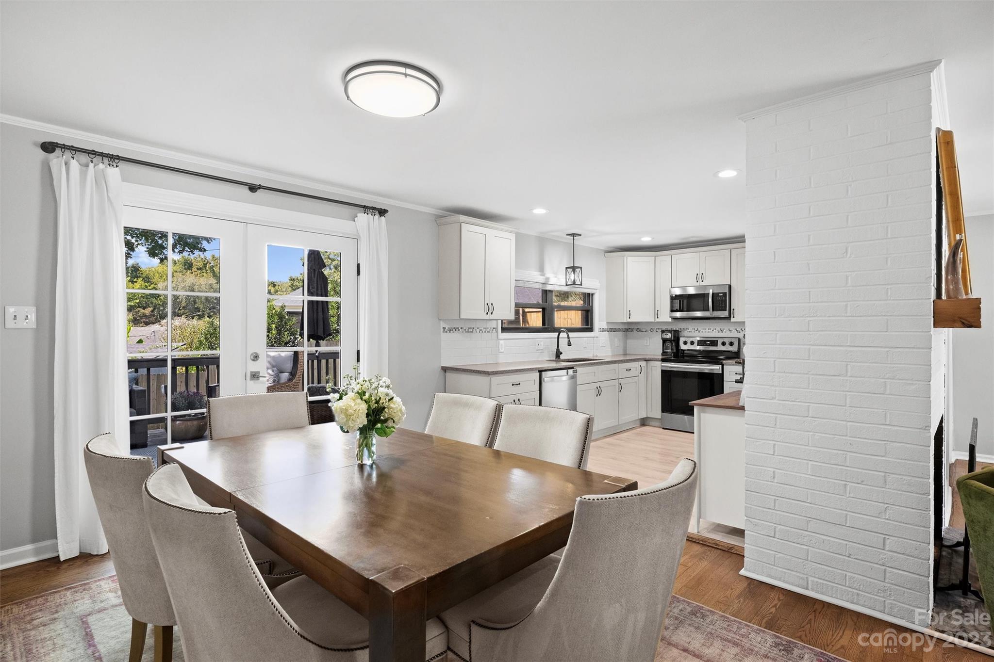 714 Brockbank Road Charlotte, NC 28209 - Photo 19 of 38 a view of a dining room with furniture and window