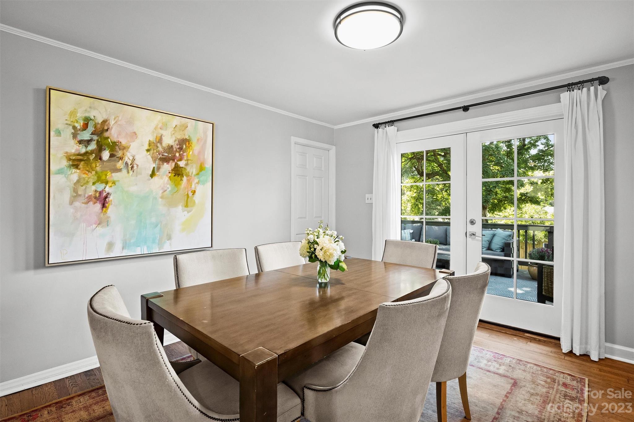 714 Brockbank Road Charlotte, NC 28209 - Photo 20 of 38 a view of a dining room with furniture window and wooden floor