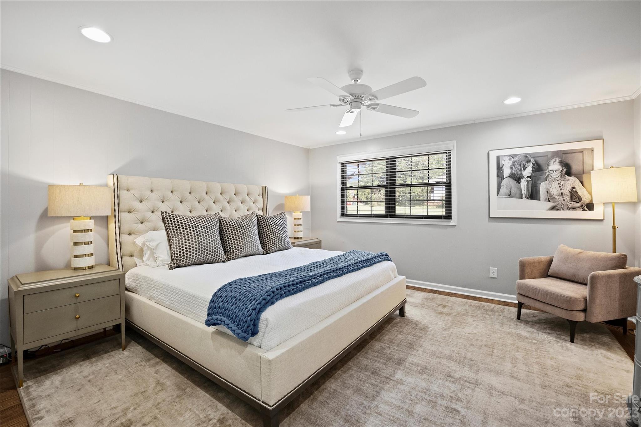 714 Brockbank Road Charlotte, NC 28209 - Photo 25 of 38 a spacious bedroom with a bed and a couch