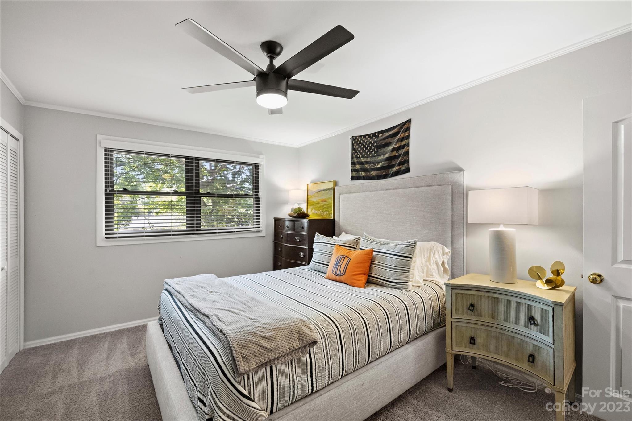 714 Brockbank Road Charlotte, NC 28209 - Photo 30 of 38 a bedroom with a bed and window