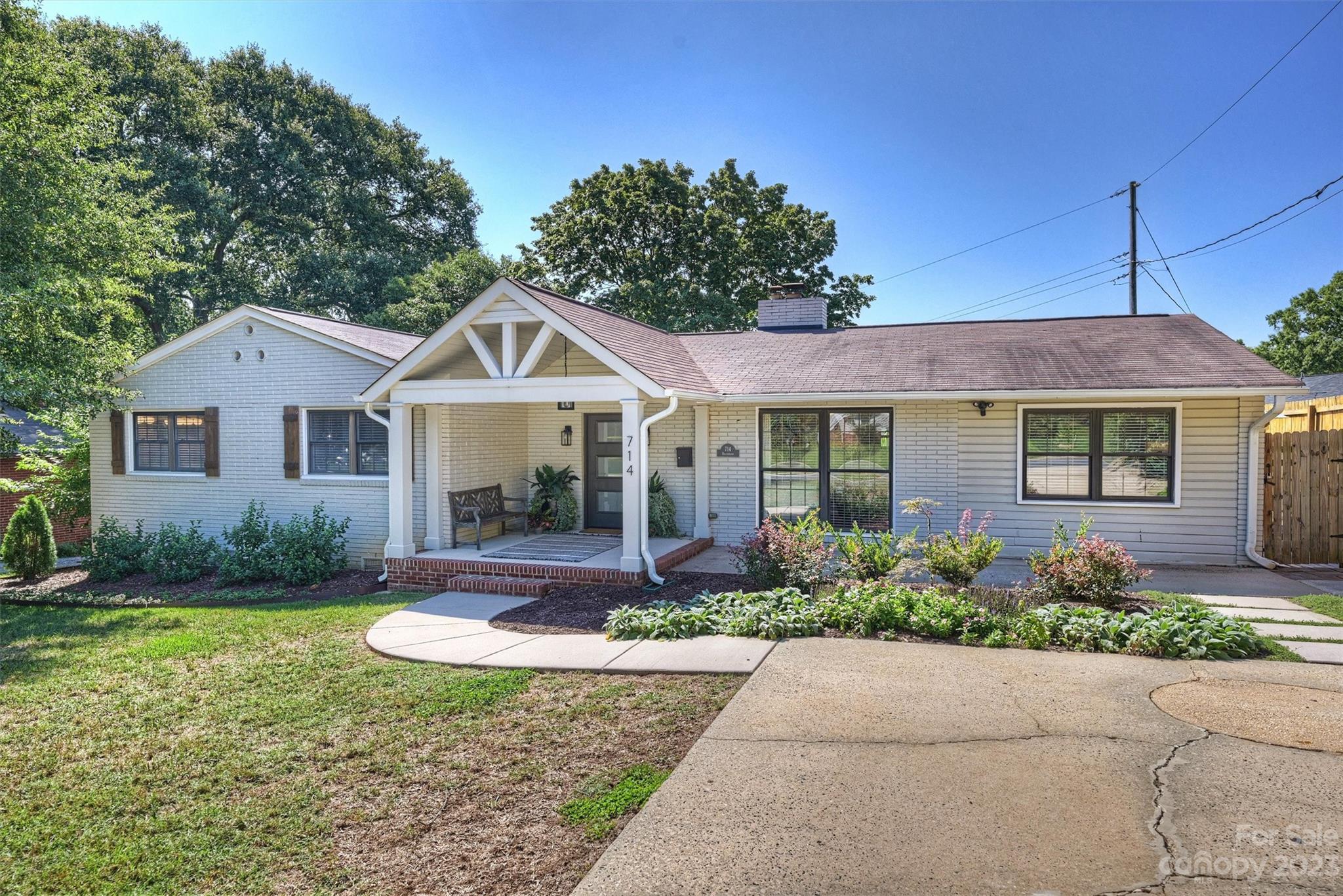 714 Brockbank Road Charlotte, NC 28209 - Photo 3 of 38 a front view of a house with garden