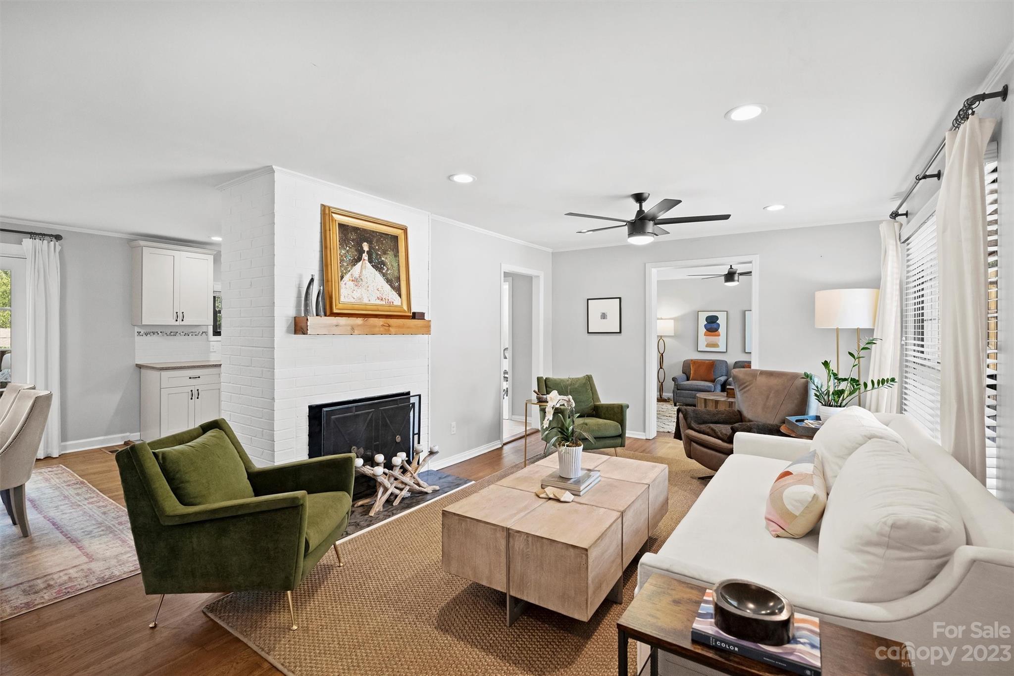 714 Brockbank Road Charlotte, NC 28209 - Photo 6 of 38 a living room with furniture and a fireplace