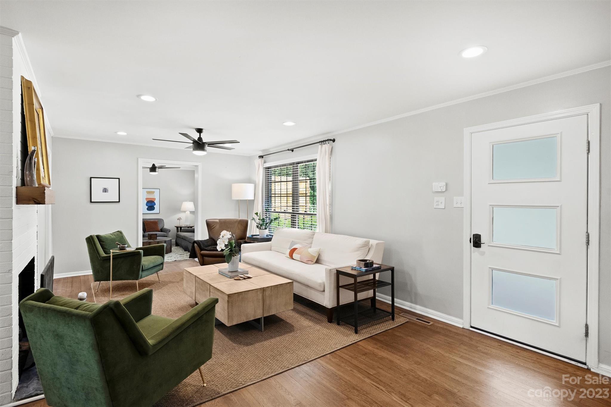 714 Brockbank Road Charlotte, NC 28209 - Photo 7 of 38 a living room with furniture and wooden floor