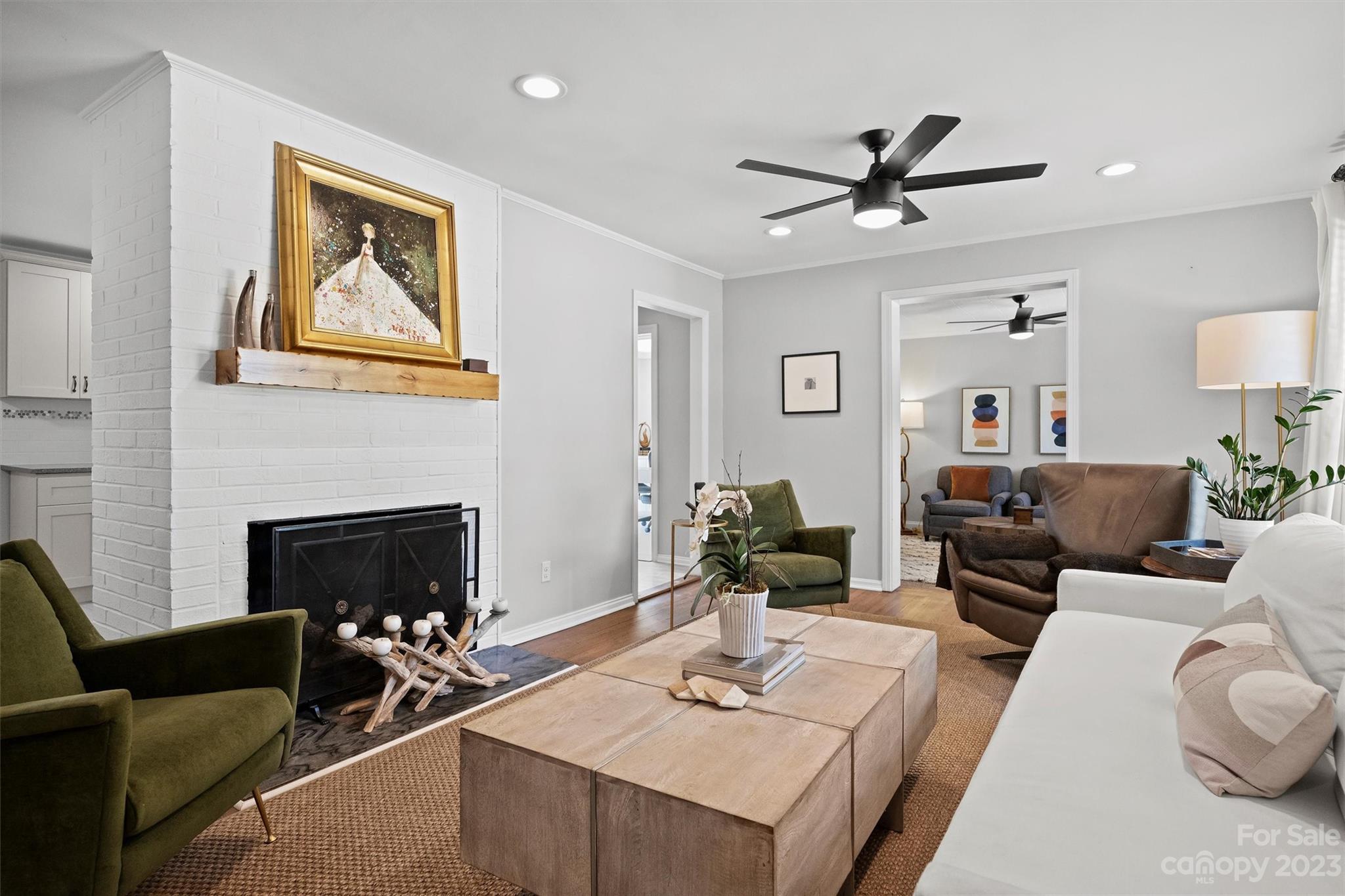 714 Brockbank Road Charlotte, NC 28209 - Photo 8 of 38 a living room with furniture and a fireplace