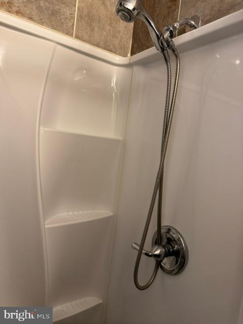 4603 Raleigh Road Temple Hills, MD 20748 - Photo 30 of 40 a bathroom with a shower