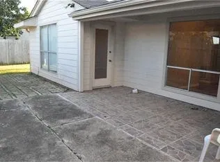 a view of an empty room with a door