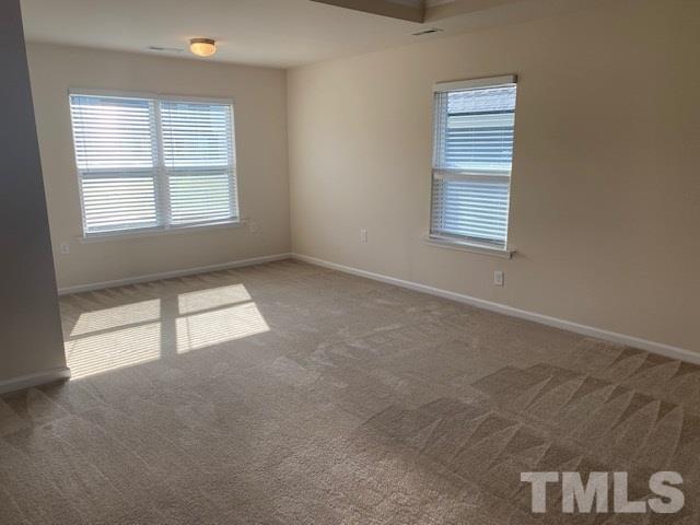 674 Brook Pine Trail Apex, NC 27523 - Photo 14 of 30 an empty room with windows