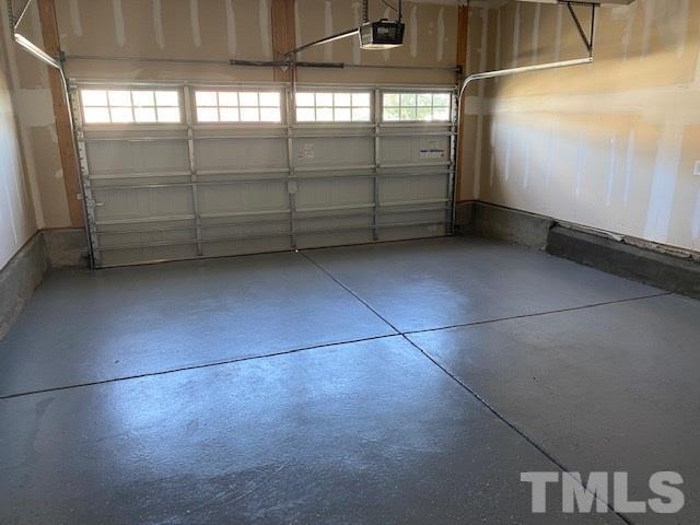 674 Brook Pine Trail Apex, NC 27523 - Photo 22 of 30 a view of a garage