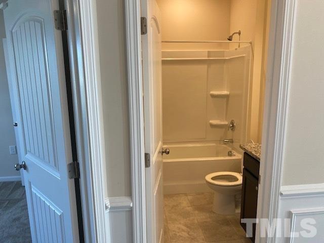 674 Brook Pine Trail Apex, NC 27523 - Photo 5 of 30 a bathroom with a shower