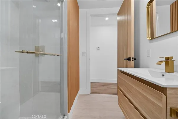 a bathroom with a sink and mirror