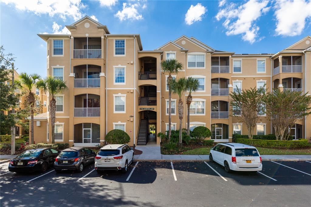a cars parked in front of a building