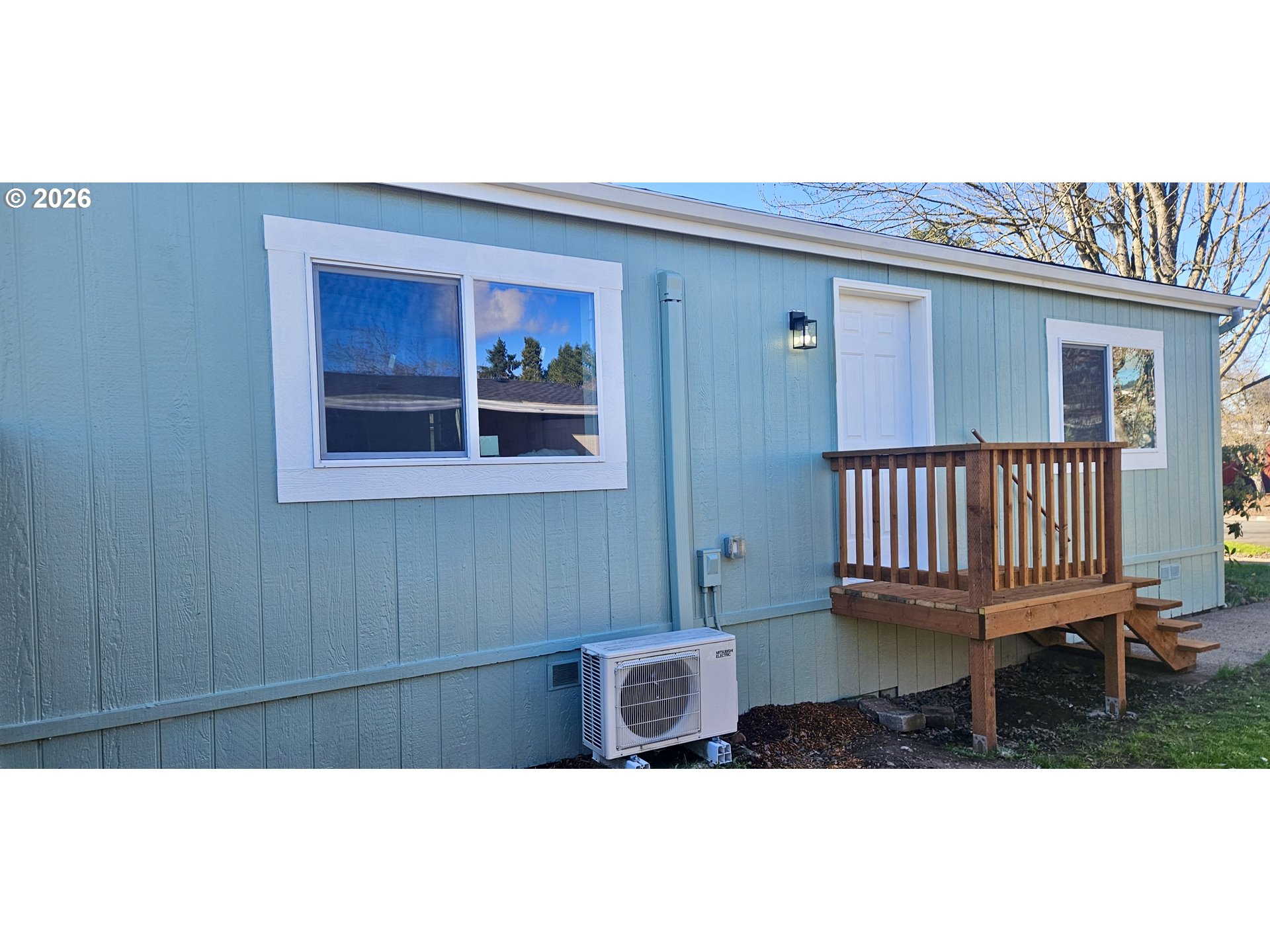 451 Lochaven Avenue Springfield, OR 97477 - Photo 19 of 21 a balcony with a table and chair