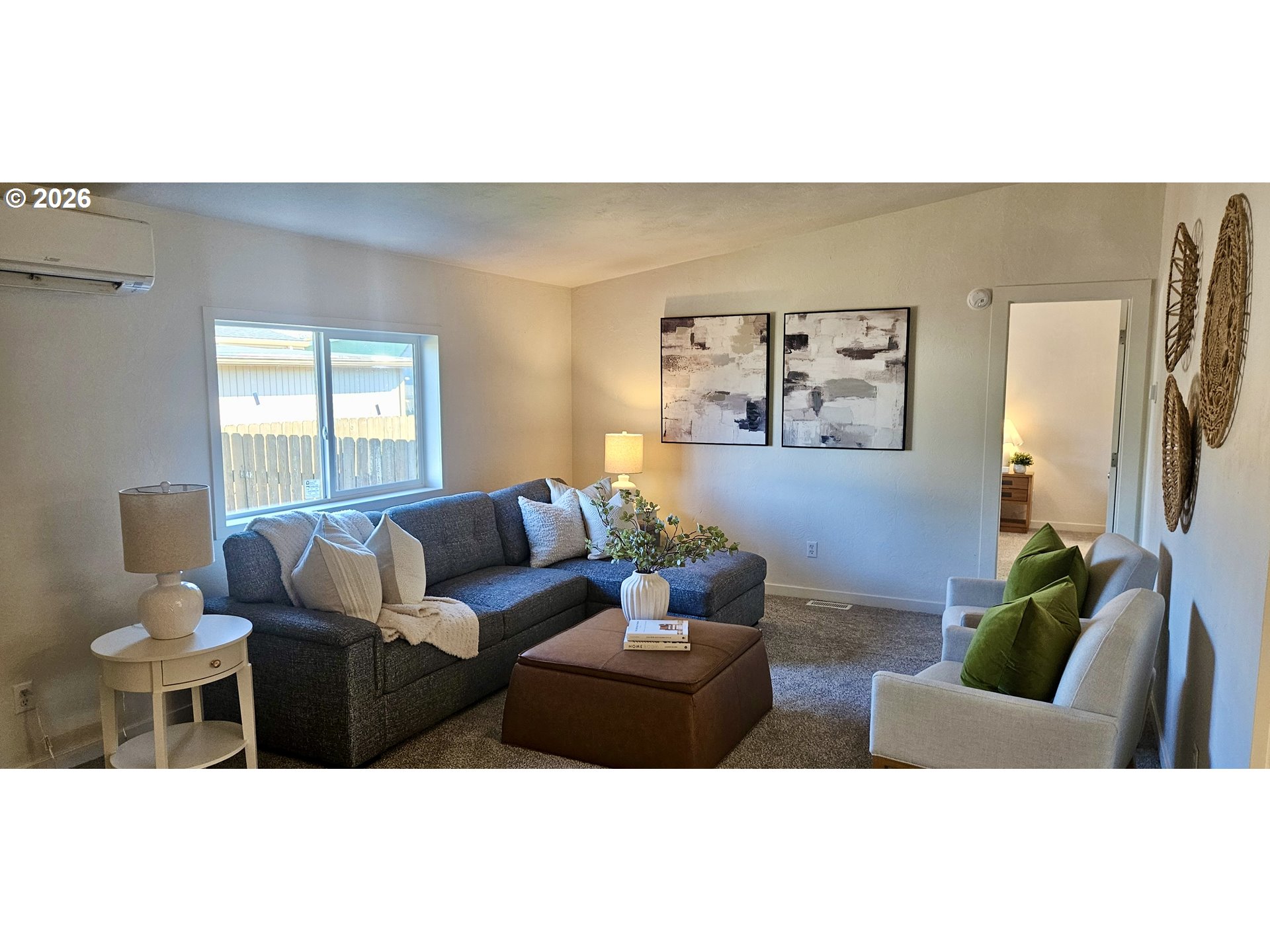 451 Lochaven Avenue Springfield, OR 97477 - Photo 2 of 21 a living room with furniture and a large window