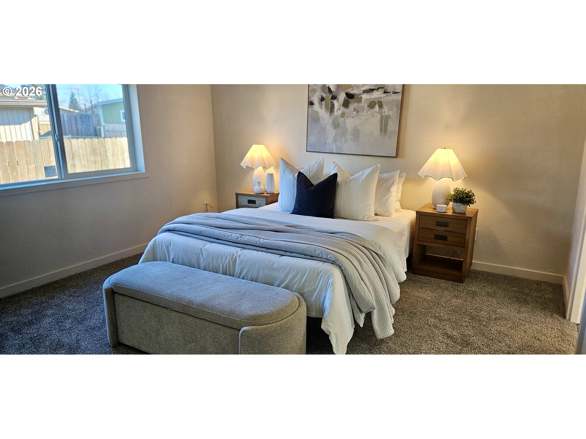 451 Lochaven Avenue Springfield, OR 97477 - Photo 3 of 21 a bedroom with a bed and window