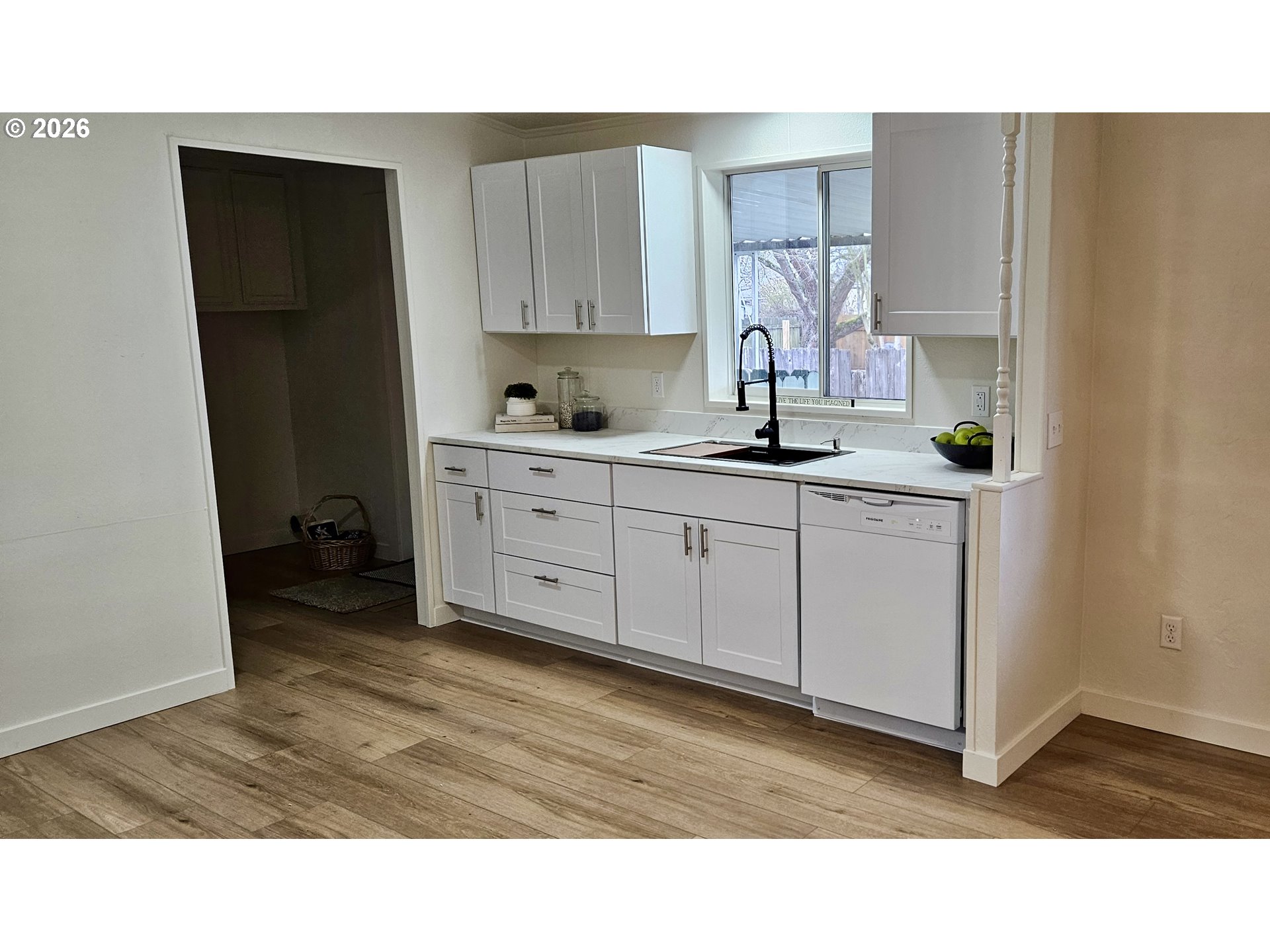 451 Lochaven Avenue Springfield, OR 97477 - Photo 5 of 21 a kitchen with a sink and cabinets