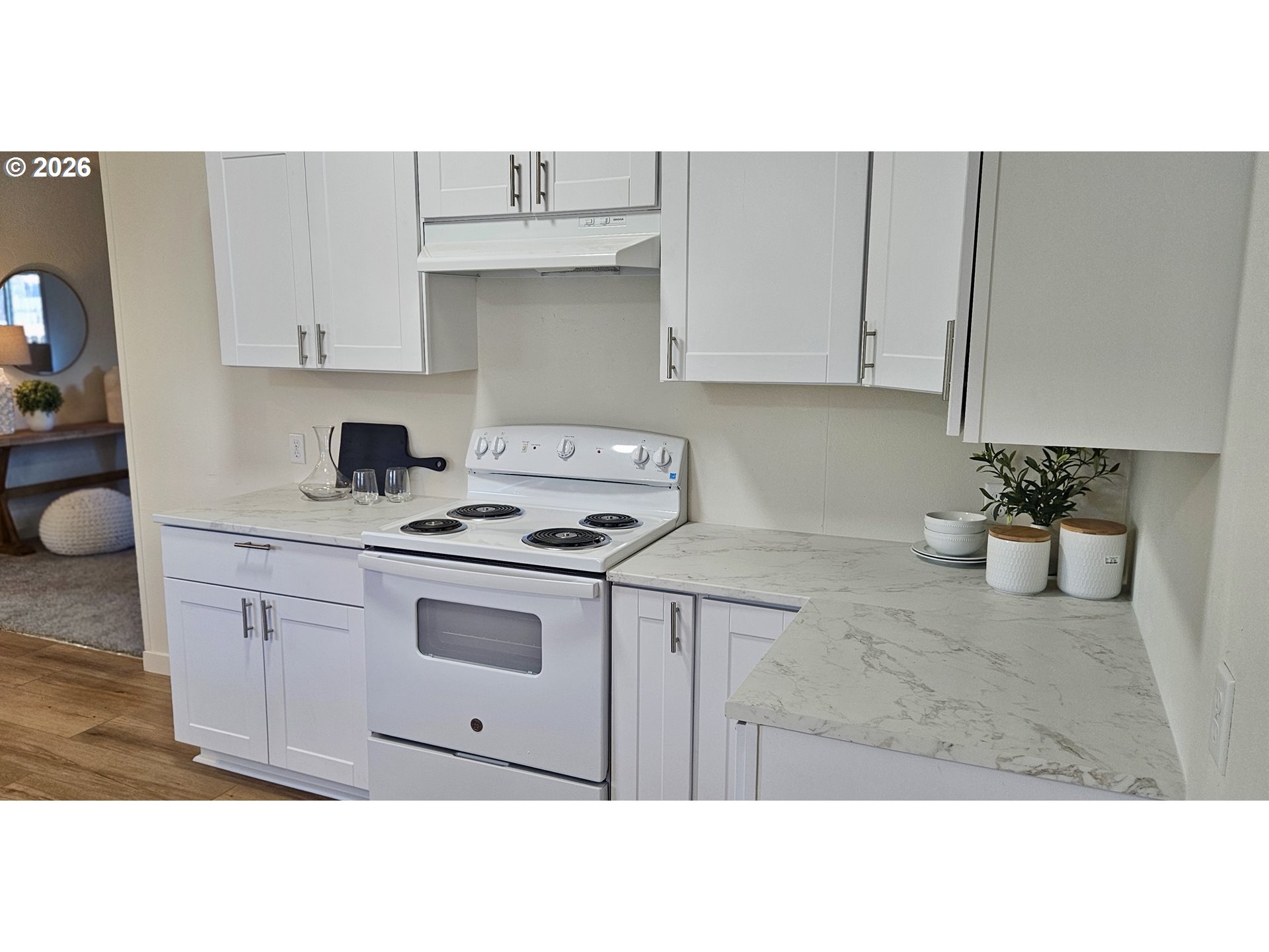 451 Lochaven Avenue Springfield, OR 97477 - Photo 7 of 21 a kitchen with stainless steel appliances granite countertop a sink stove and cabinets