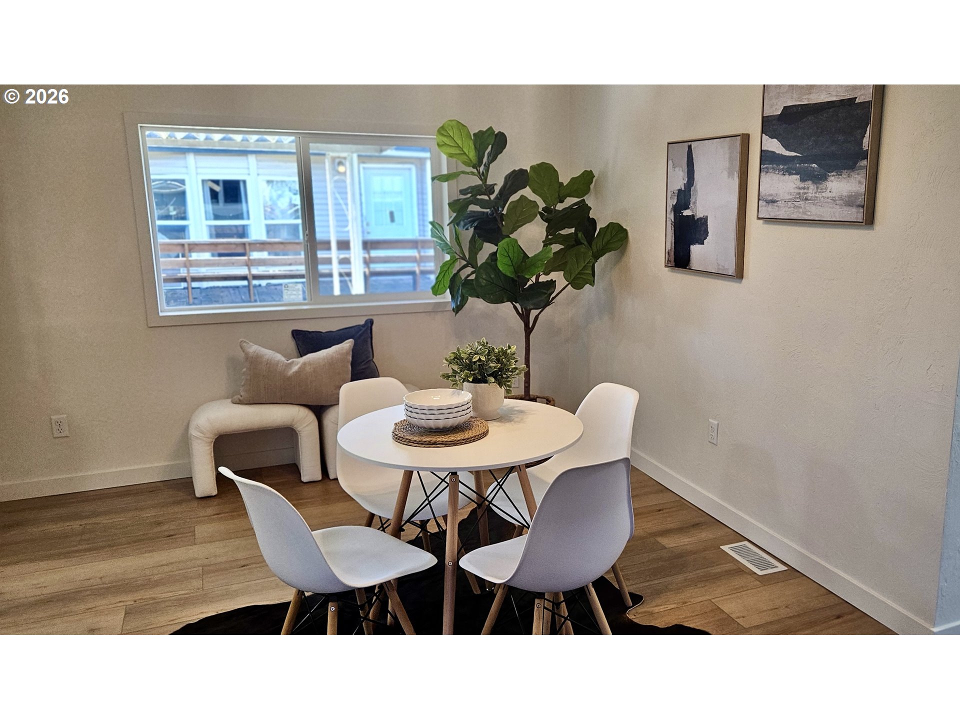 451 Lochaven Avenue Springfield, OR 97477 - Photo 8 of 21 a dining room with furniture and wooden floor