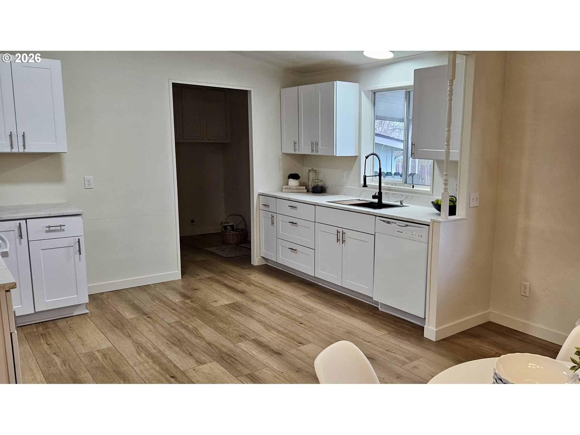 451 Lochaven Avenue Springfield, OR 97477 - Photo 9 of 21 a kitchen with sink and cabinets
