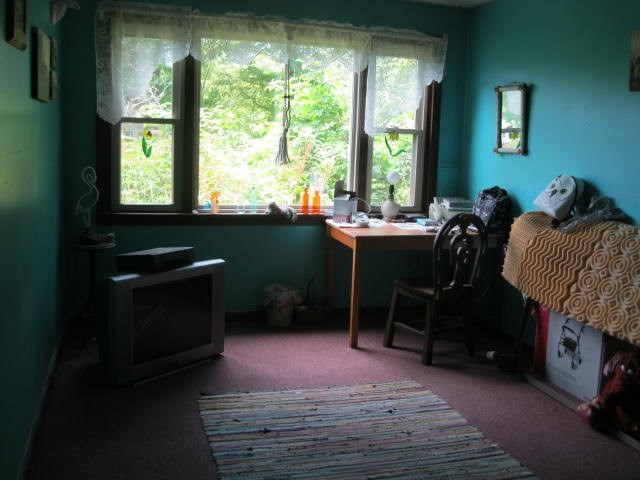 73 Ingell Road Chester, MA 01011 - Photo 9 of 19 a bed room with a bed and a window