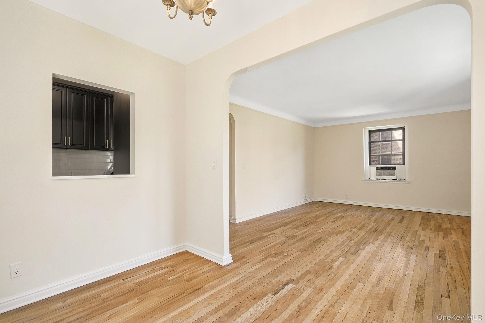 196 Garth Road, Unit 2F Scarsdale, NY 10583 - Photo 8 of 23 Alternate View Living Room from Dining Room