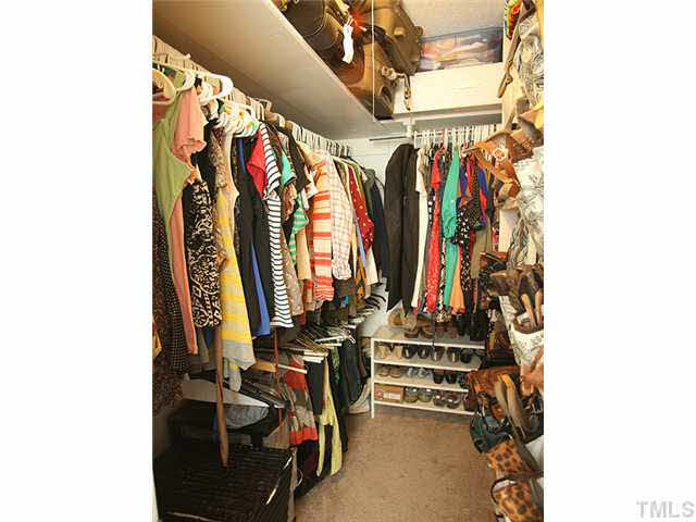 1108 Hardimont Road Raleigh, NC 27609 - Photo 13 of 25 a view of walk in closet with clothes