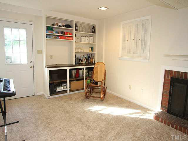1108 Hardimont Road Raleigh, NC 27609 - Photo 19 of 25 a view of a livingroom with furniture and a fireplace