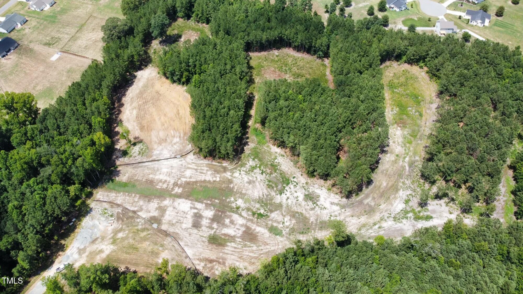 39 Edith Lane Willow Spring, NC 27592 - Photo 1 of 12 dji_fly_20240708_143334_139_172046426051