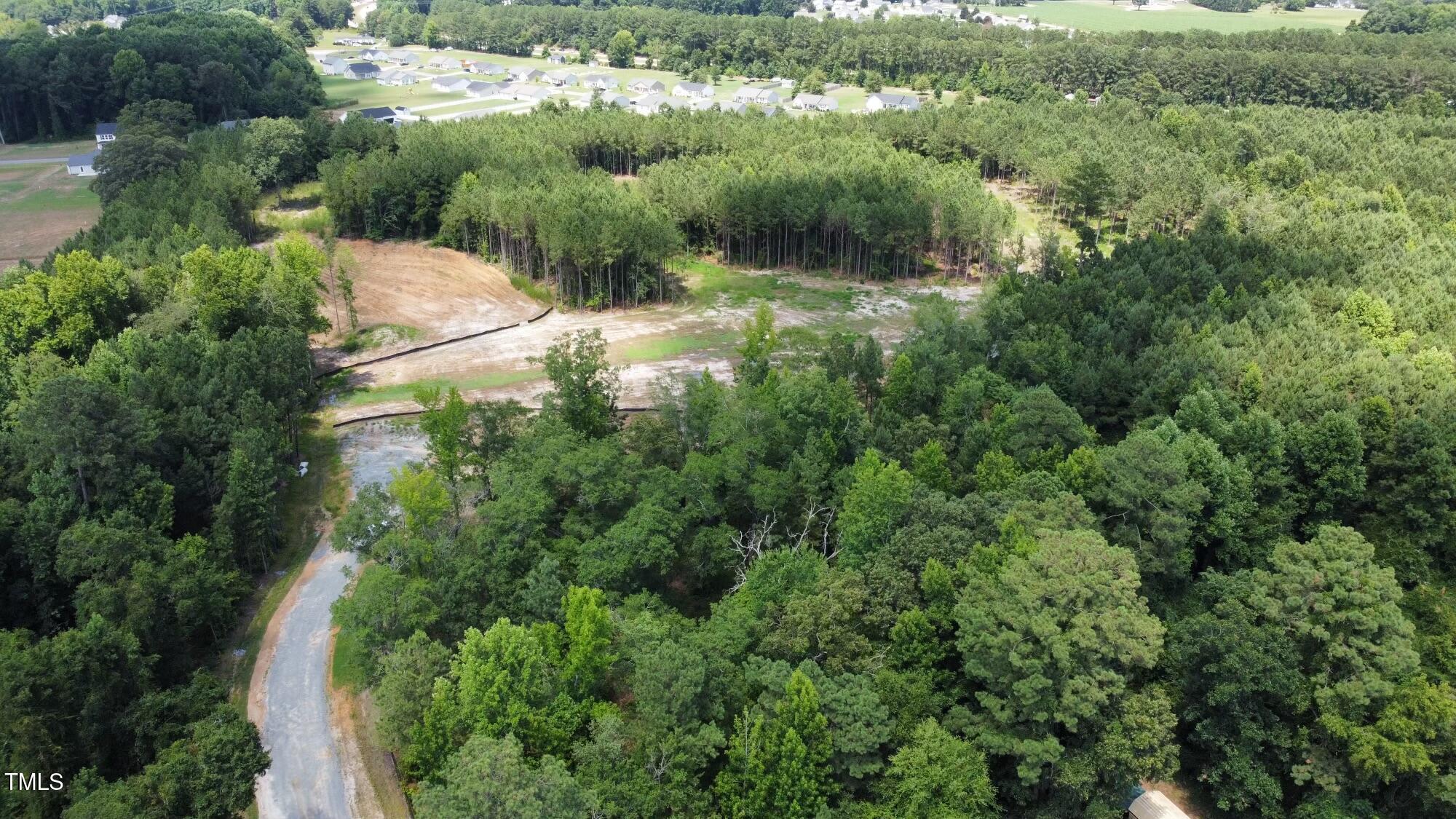 39 Edith Lane Willow Spring, NC 27592 - Photo 2 of 12 dji_fly_20240708_143714_147_172046426002