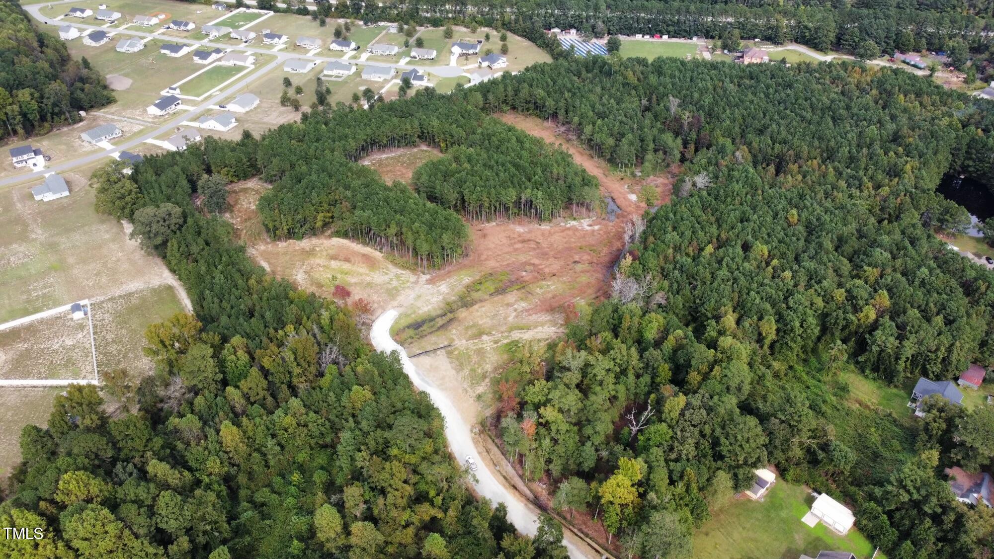39 Edith Lane Willow Spring, NC 27592 - Photo 4 of 12 dji_fly_20241009_150350_161_172850137514