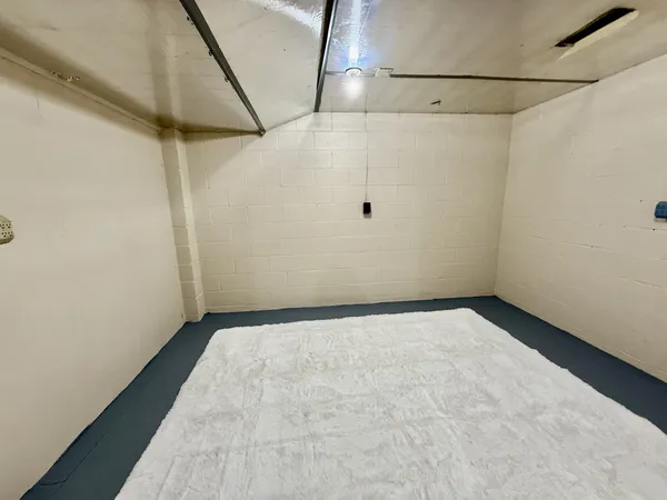 a bathroom with a toilet sink and a shower