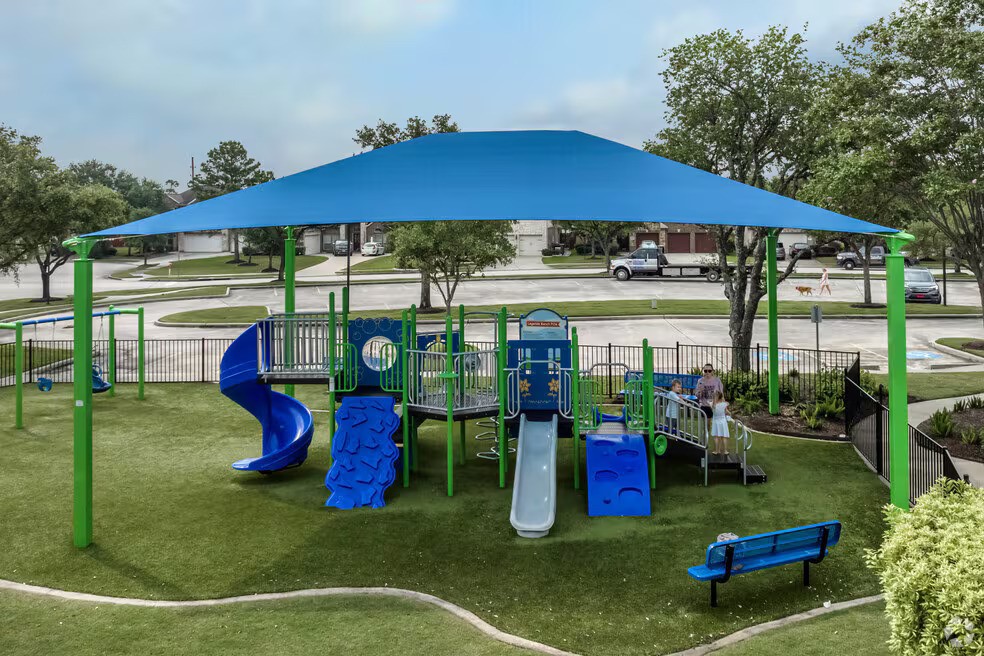30426 Sunset Falls Drive Spring, TX 77386 - Photo 22 of 30 a view of a chairs and table in backyard