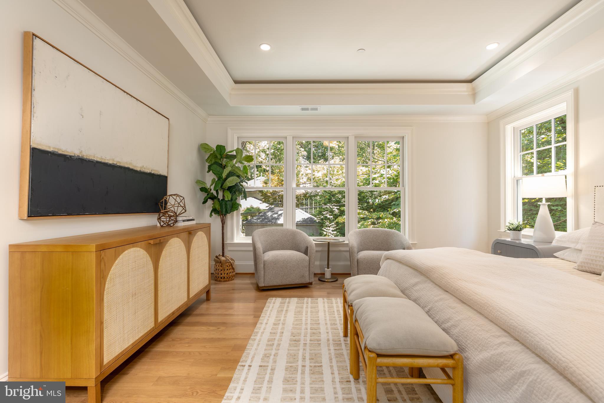 5413 Center Street Chevy Chase, MD 20815 - Photo 38 of 71 a living room with furniture and a flat screen tv