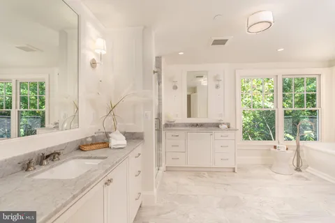 a view of entrance gate of a house with a blue gate