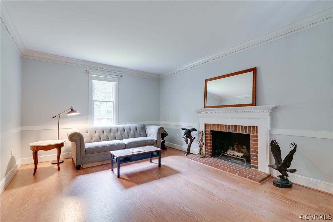 4616 Ladysmith Road Ruther Glen, VA 22546 - Photo 15 of 44 a living room with furniture and a fireplace