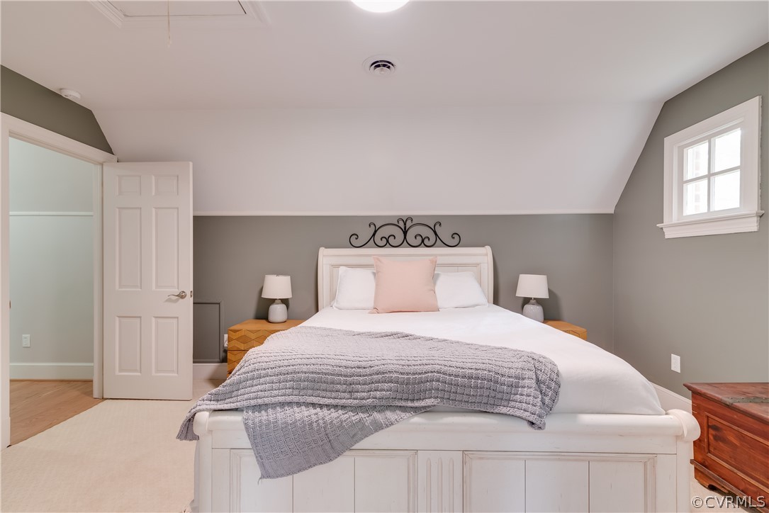 4616 Ladysmith Road Ruther Glen, VA 22546 - Photo 27 of 44 a bedroom with a bed and a night stand
